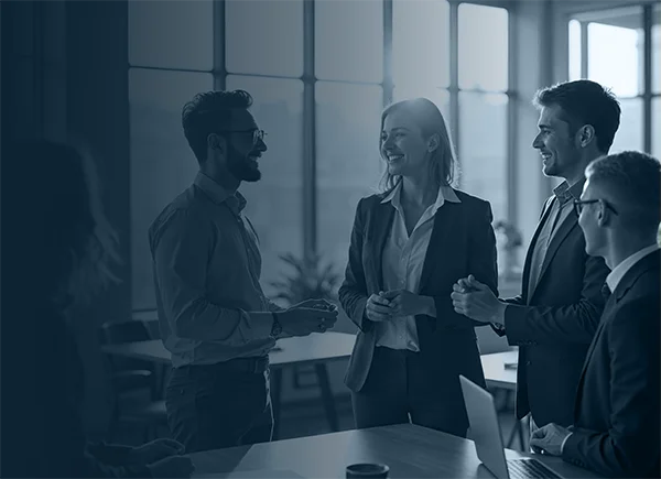 Group of professionals shaking hands, representing the asset finance experts at Odessa.